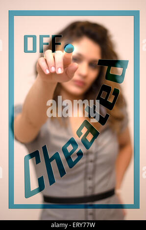young woman turning offCheated on hologram screen Stock Photo