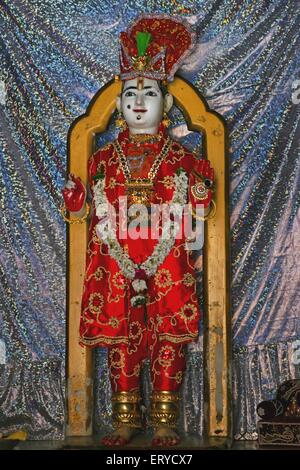 Idol of Ghanshyam Maharaj ; Swaminarayan temple ; Chhapaiya near Ayodhya ; Faizabad ; Uttar Pradesh ; India Stock Photo