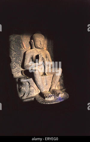 Buddha statue in cave temple hinyana pandav caves first century BC to second century AD ; Satavahana ; Nasik Stock Photo