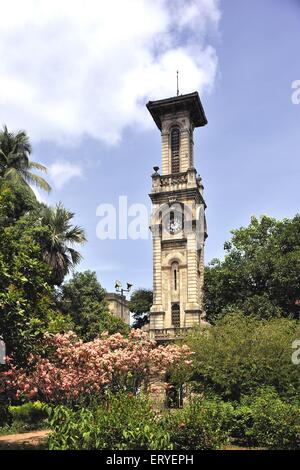 David Sassoon clock tower in Victoria Gardens or Rani Bagh now Jijamata Udyan ; Byculla ; Bombay , mumbai , maharashtra , india , asia Stock Photo
