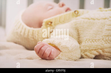 sleeping cute newborn baby, maternity concept, soft image of beautiful family Stock Photo