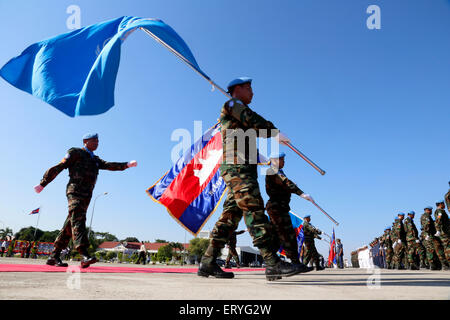 Phnom Penh, Cambodia. 10th June, 2015. Cambodian peacekeepers march at the Military Airbase in Phnom Penh, Cambodia, on June 10, 2015. Some 457 Cambodian peacekeepers arrived here on Wednesday after completing their one-year United Nations peacekeeping operations in Mali and South Sudan. Credit:  Sovannara/Xinhua/Alamy Live News Stock Photo