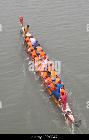 Xiangyang, China. 10th June, 2015. People practice dragon boat racing ...