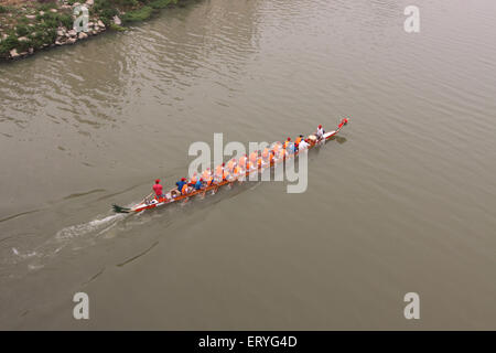 Xiangyang, China. 10th June, 2015. People practice dragon boat racing ...