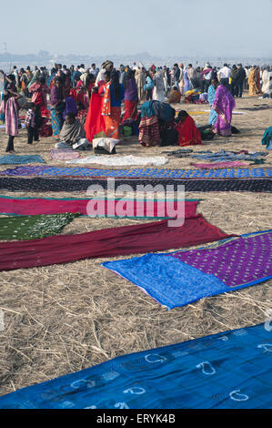 Women Drying Saree in Kumbh Mela Festival at uttar pradesh India Stock Photo