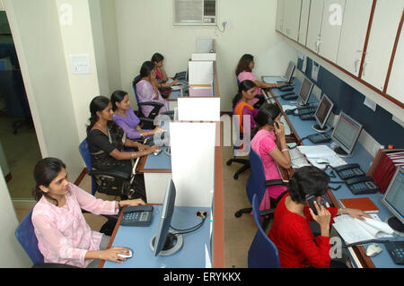 People working on computer Bombay Mumbai Maharashtra India - Stock Photo