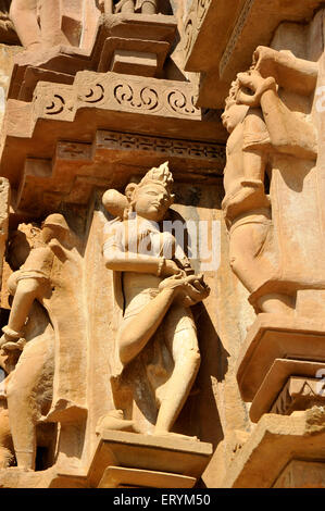 Woman taking out a thorn from the foot at chitragupt temple India Asia Stock Photo