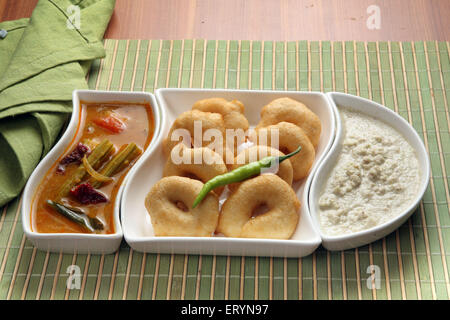 South Indian food Medu Vada Sambar and coconut chutney in plate India PR#743AH Stock Photo