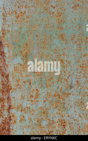 abstract corroded colorful wallpaper grunge background iron rusty artistic wall peeling paint. Oxidized metal surface. Abstract Stock Photo