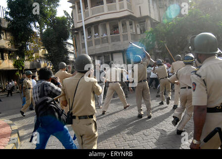 Police lathi charging during protest in Bombay Mumbai Maharashtra India Asia Stock Photo