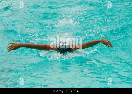 Swimmer butterfly stroke , swimming pool , Bombay, Mumbai, Maharashtra ; India , asia Stock Photo