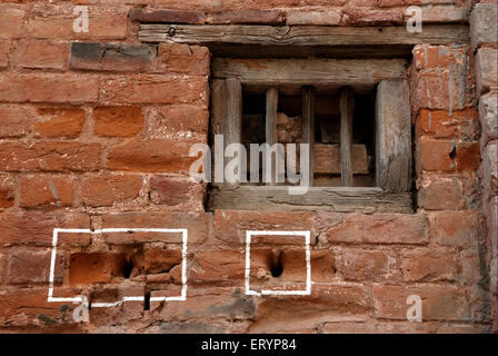 Bullet marks visible on preserved wall at Jallianwala or Jalianwala Bagh ; Amritsar ; Punjab ; India Stock Photo