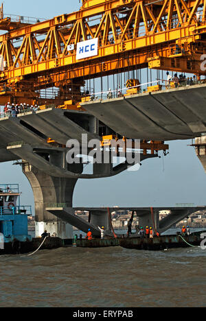 Giant iron truss used to lift last block in construction Bandra Worli Sea link at Worli Bombay Mumbai Stock Photo