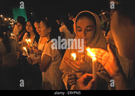 26/11 Mumbai terror attack 2008 , people lighting candles for victims , Marine Drive , Bombay , Mumbai , Maharashtra , India , Asia Stock Photo