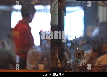 26/11 Mumbai terror attack 2008 , bullet mark on glass at Cafe Leopold  , Colaba , Bombay , Mumbai , Maharashtra , India , Asia Stock Photo