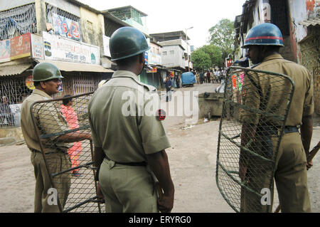 Police to control riot , Cheeta Camp , Trombay , Bombay , Mumbai , Maharashtra , India , Indian security , Asia Stock Photo