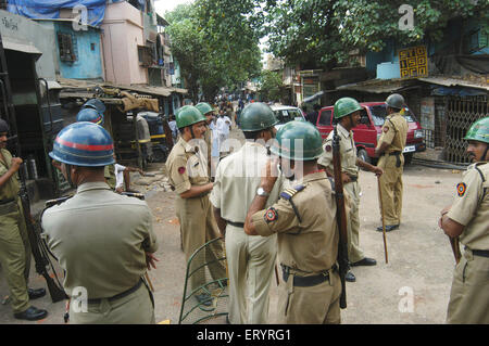 Police to control riot , Cheeta Camp , Trombay , Bombay , Mumbai , Maharashtra , India , Indian security , Asia Stock Photo