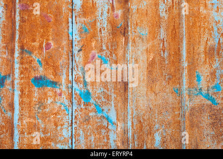 abstract corroded colorful wallpaper grunge background iron rusty artistic wall peeling paint. Oxidized metal surface. Abstract Stock Photo