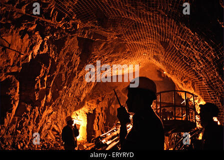 Engineers inspect tunnelling at site of hydroelectric project ; Uri ; Jammu and Kashmir ; India 6 April 2008 Stock Photo
