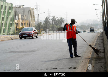 Labourer cleaning roads in Bombay Mumbai ; Maharashtra ; India Stock Photo