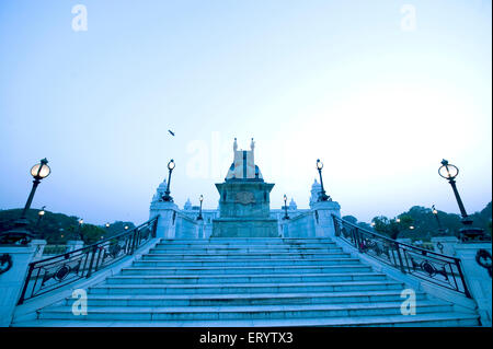 Queen Victoria seated on throne at dusk in front of Victoria Memorial, Calcutta, Kolkata, West Bengal, India, Asia Stock Photo
