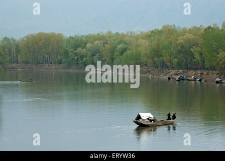 Sand extracting boat , Jhelum river , Sopore , Baramulla District , Jammu and Kashmir , India , Asia Stock Photo