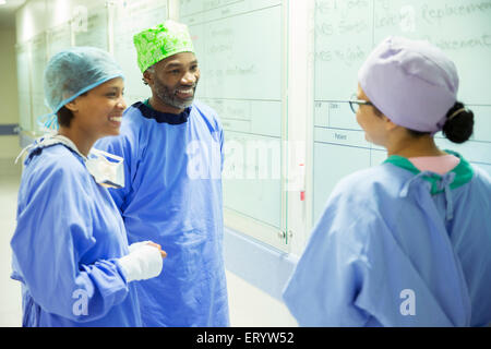 Surgeons talking in hospital Stock Photo