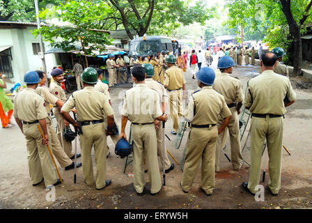 Police on guard at ; Mulund ; Bombay ; Mumbai ; Maharashtra ; India NOMR Stock Photo