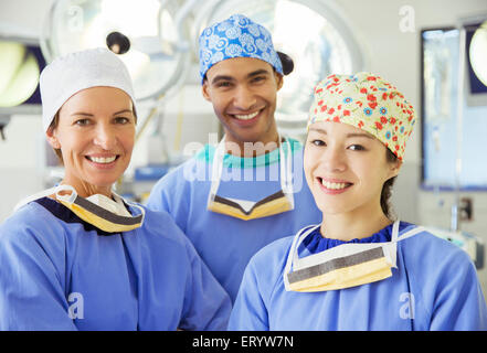 Portrait of smiling surgeons Stock Photo