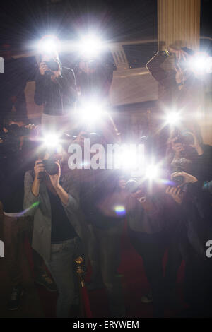 Paparazzi photographers at red carpet event Stock Photo