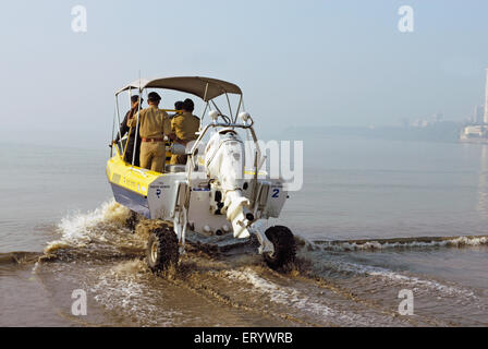 Police commandos in amphibious vehicles at  ; Marine Drive  ; Bombay ; Mumbai ; Maharashtra  ; India Stock Photo