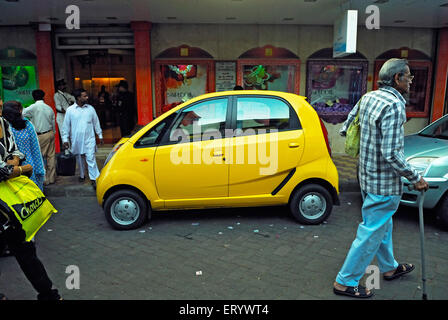 Tata nano car parked on the street ; Bombay ; Mumbai ; Maharashtra ; India Stock Photo