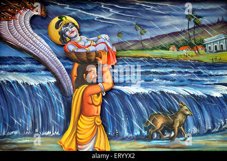 Indian mythology , Shri Krishna Leela , Vasudev with baby Krishna  crossing Yamuna River , Stock Photo