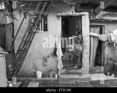Dweller in Bhatwadi and Devnar slum ; Bombay Mumbai ; Maharashtra ; India Stock Photo