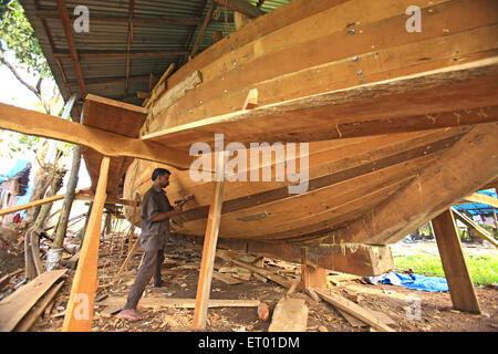 Making a new wooden boat in a shipyard at Duyong Island in ...