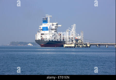 Oil tanker ship anchored ; Cochin Kochi harbour jetty ; Kerala ; India Stock Photo