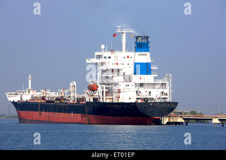 Oil tanker ship anchored Cochin Kochi harbour jetty Kerala India Asia Stock Photo