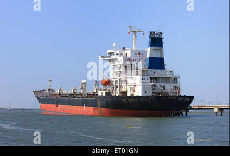 Oil tanker ship anchored at Cochin Kochi harbour jetty Kerala India Asia Stock Photo