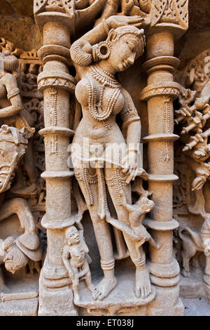 Monkey troubling Apsara ; Rani ki Vav ; Ranki Vav ; step well ; stepwell ; Patan ; Gujarat ; India ; Asia Stock Photo