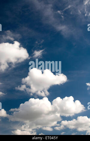 Blue sky background with white clouds Stock Photo - Alamy
