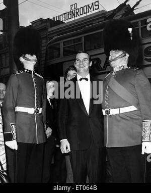 Stanley Baker star of the film 'Zulu' photographed on his arrival at the Olympia cinema, Cardiff to attend the Welsh premiere of the film. 18th March 1964. Stock Photo