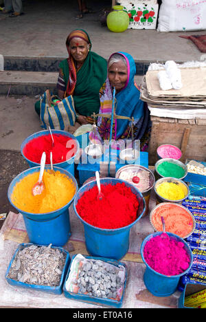 Vendor selling Colour powder at Bijapur market ; Karnataka ; India NO MR Stock Photo