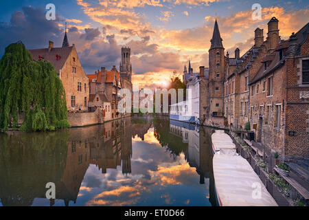 Bruges. Image of famous most photographed location in Bruges, Belgium during dramatic sunset. Stock Photo