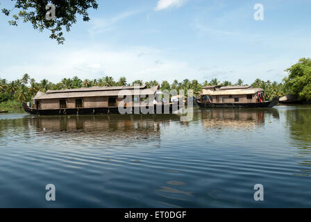 Houseboats in backwaters ; Kuttanad ; Alleppey Alappuzha ; Kerala ; India Stock Photo