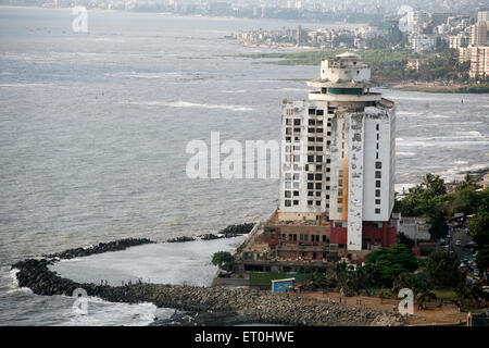 Hotel Sea Rock can be seen from the construction site of the Bandra Worli sea link on Arabian sea ; Bombay Mumbai Stock Photo