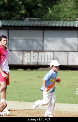 Sachin Tendulkar , Indian cricketer , greatest batsmen , net practice with son Arjun Tendulkar , Bombay , Mumbai , Maharashtra , India , Asia Stock Photo