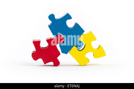 Jigsaw puzzle pieces isolated on a white background Stock Photo