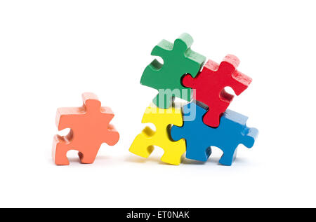 Jigsaw puzzle pieces isolated on a white background Stock Photo