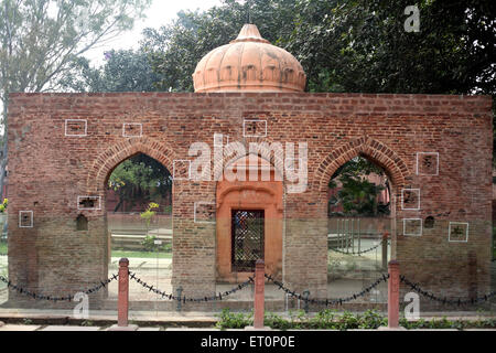 Bullet marks visible on preserved wall at Jalianwala Bagh ; Amritsar ; Punjab ; India Stock Photo