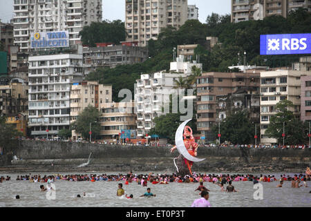 Lord ganesh immersion ; Girgaum chowpatty ; Bombay Mumbai ; Maharashtra ; India Stock Photo